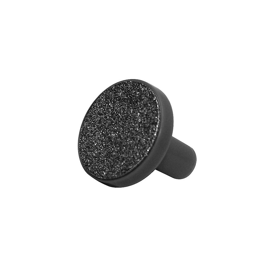 Ein schwarzer Nagelknipser mit glitzernder Oberfläche und Griff.