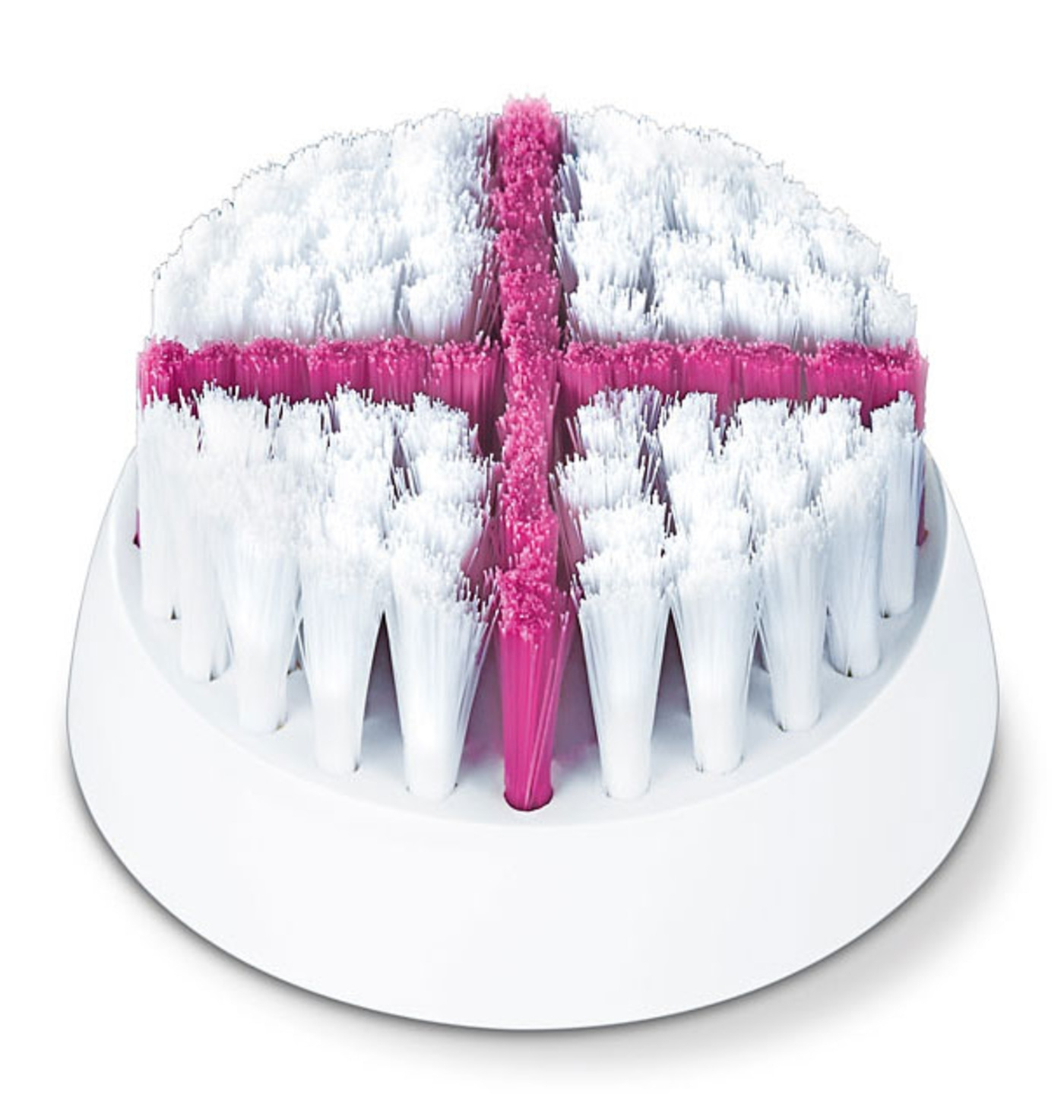 White and pink brush head, round, for facial cleansing, close-up, isolated