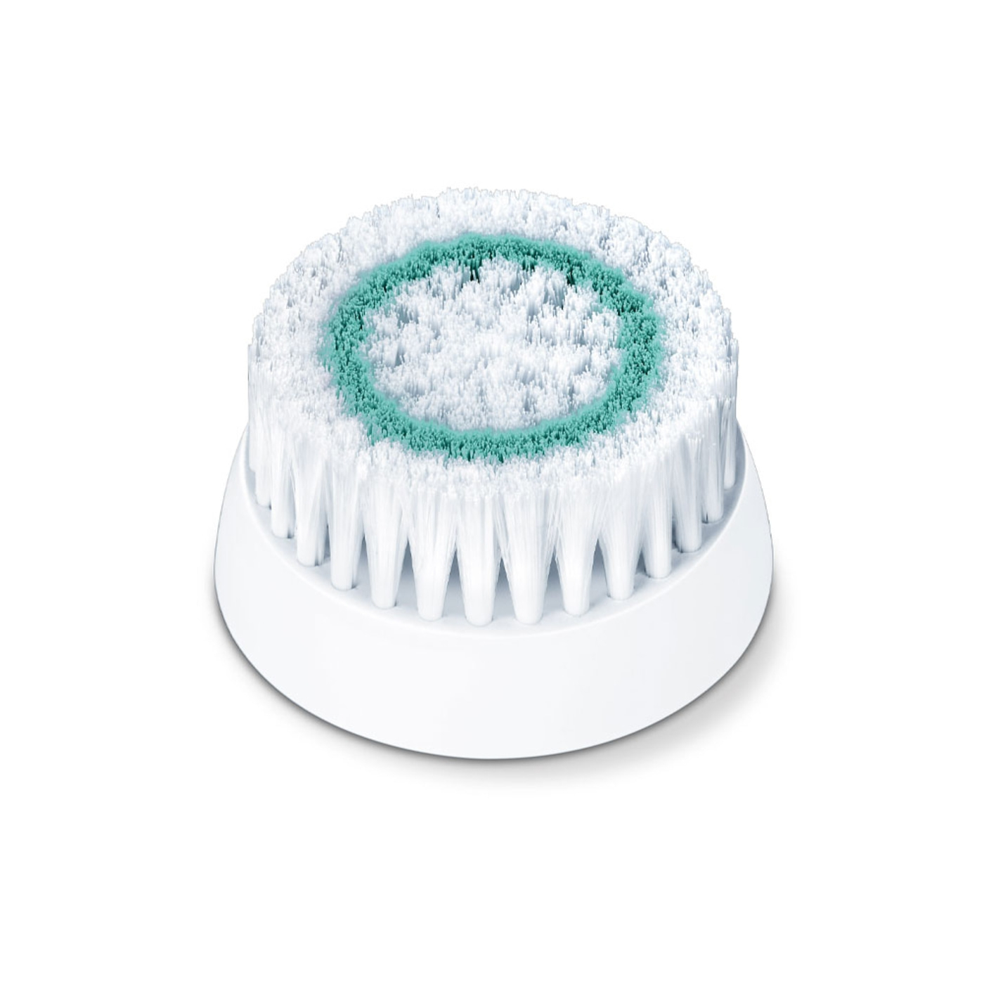 White round brush head with green center for facial cleansing, isolated.